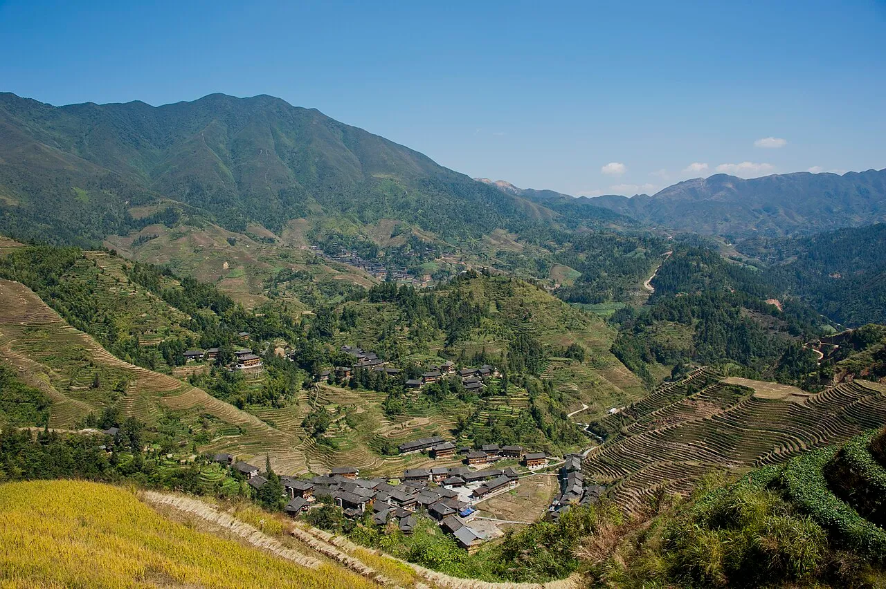 Dazhai village at the bottom of a wide terraced mountain valley