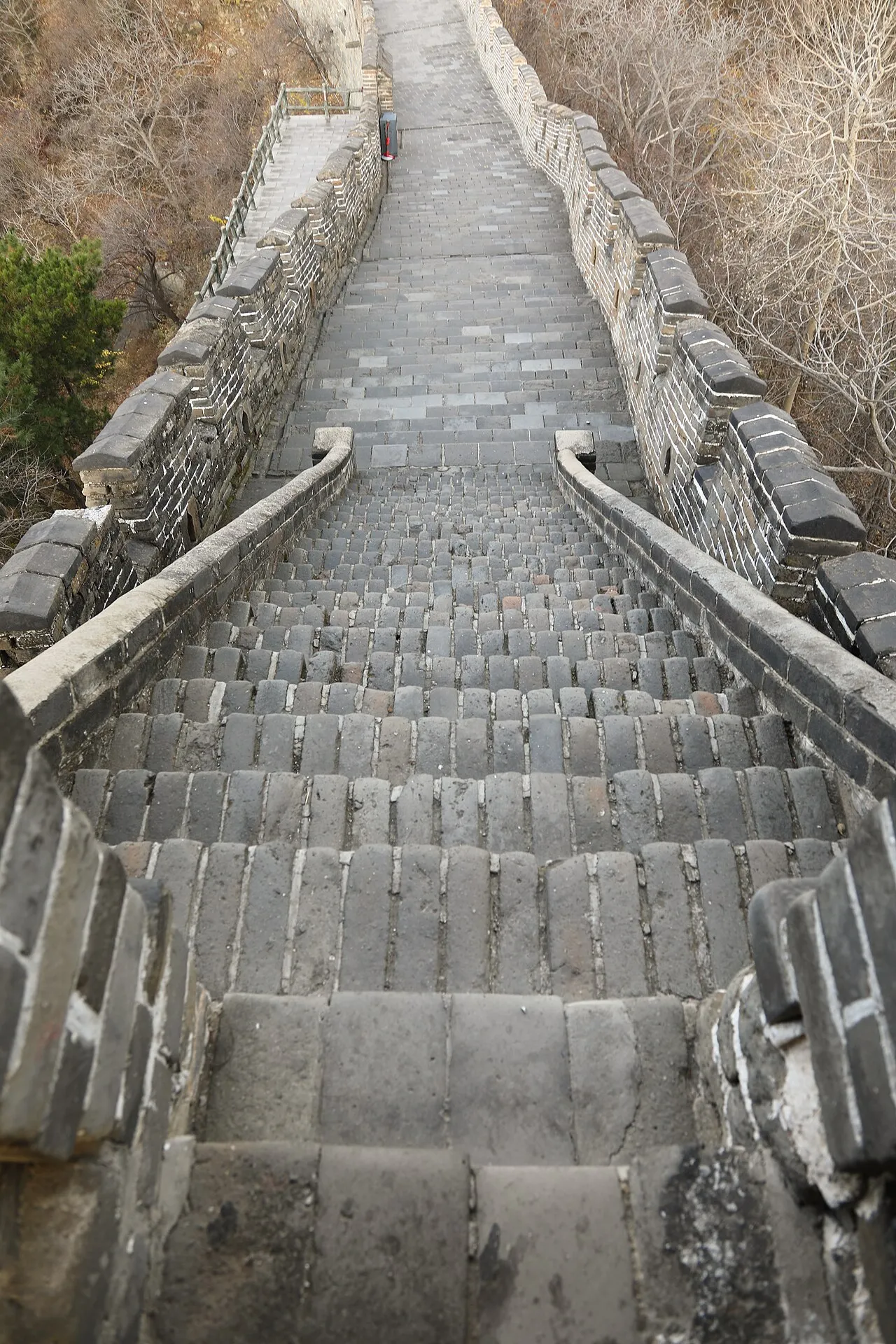 A long flight of stone steps between battlements on the Mutianyu Great Wall