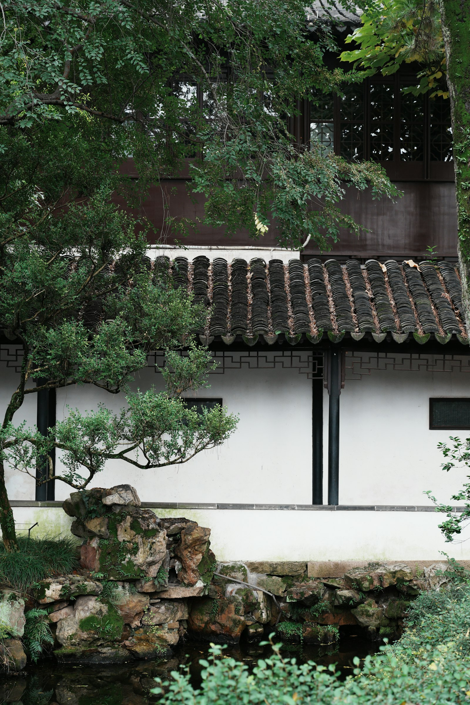 White walls, tiled rooflines and greenery at Suzhou’s Humble Administrator’s Garden