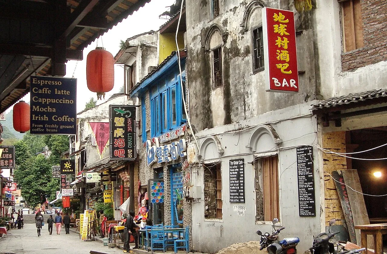 Shopfronts, cafe signs and bars lining Yangshuo West Street
